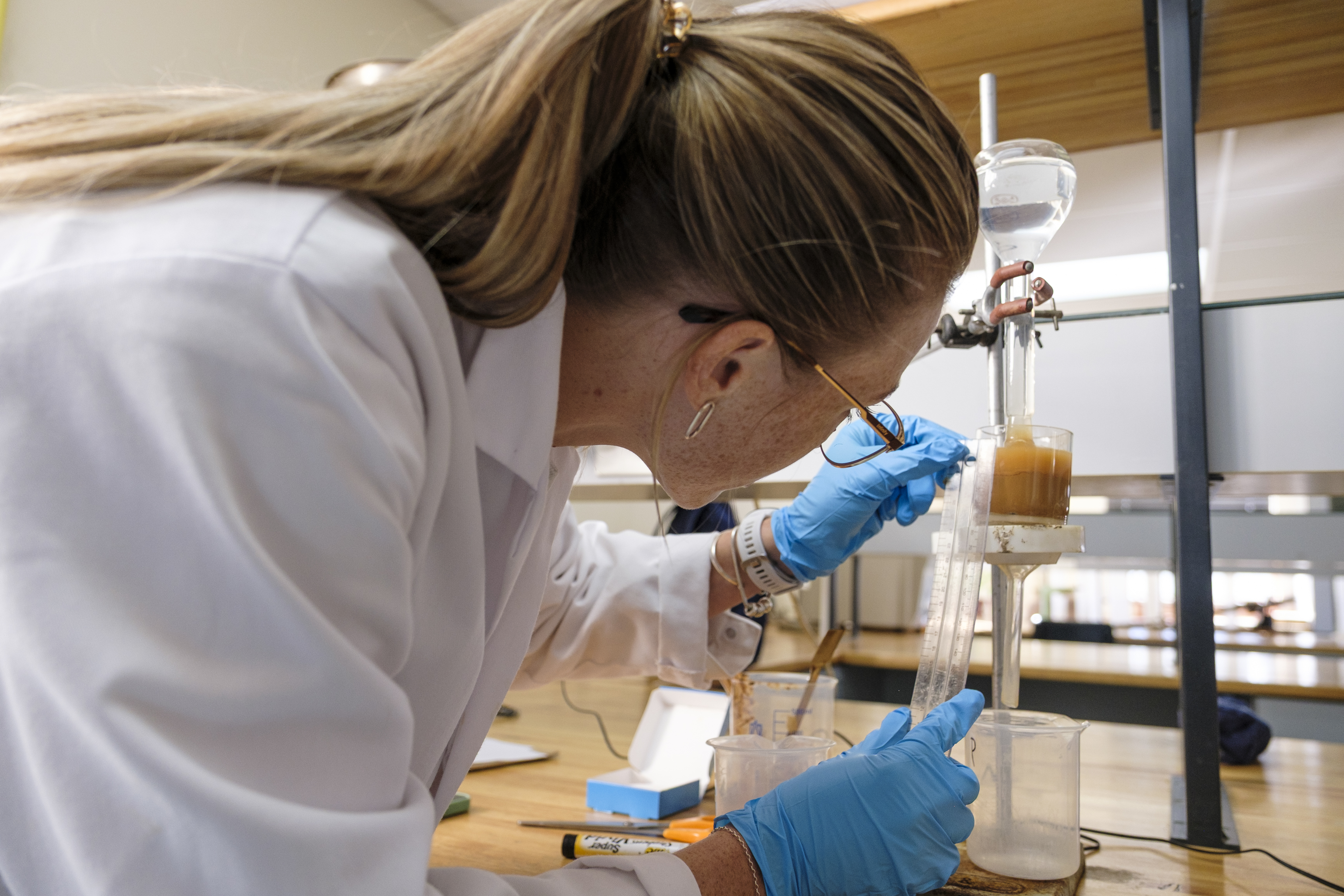 Lab tech looking at samples 