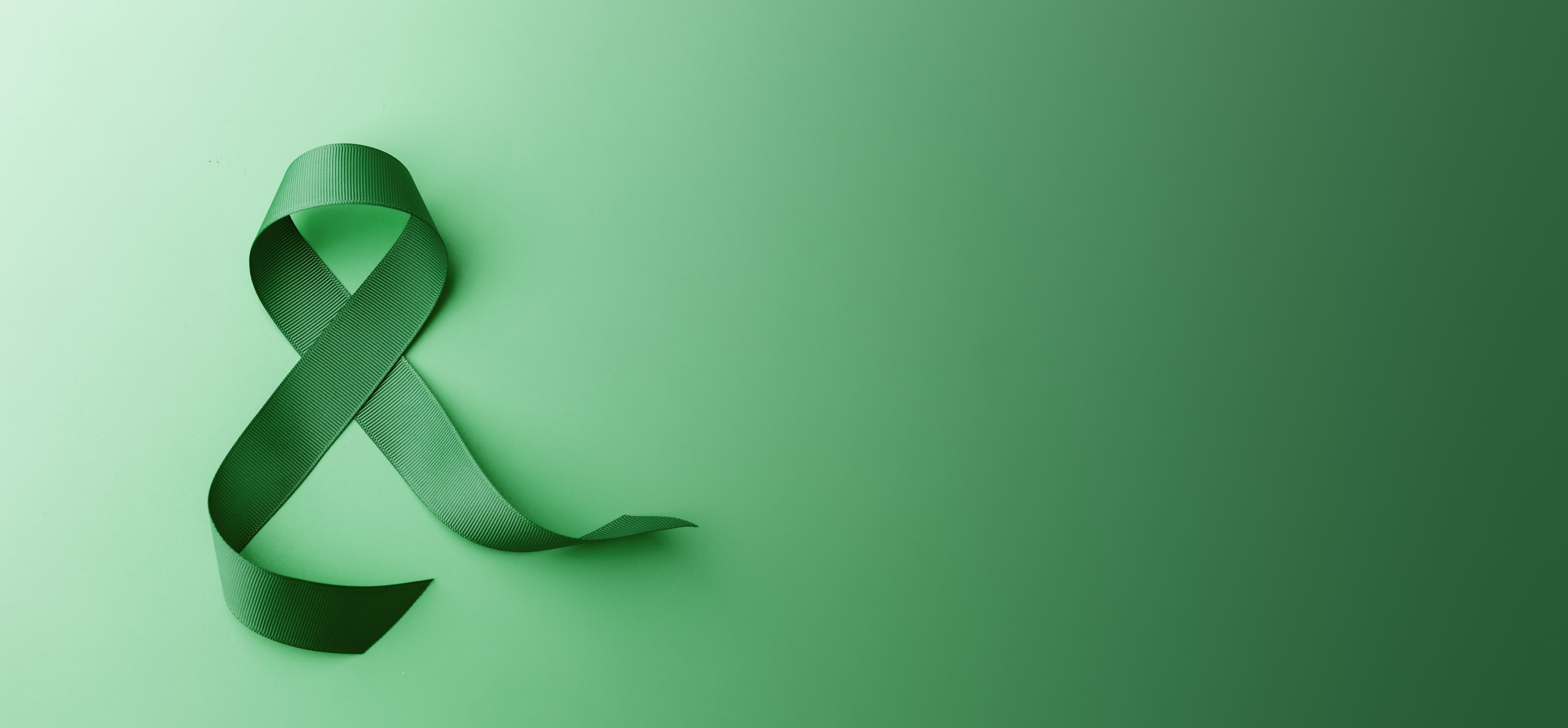 The green ribbon is the international symbol of mental health awareness