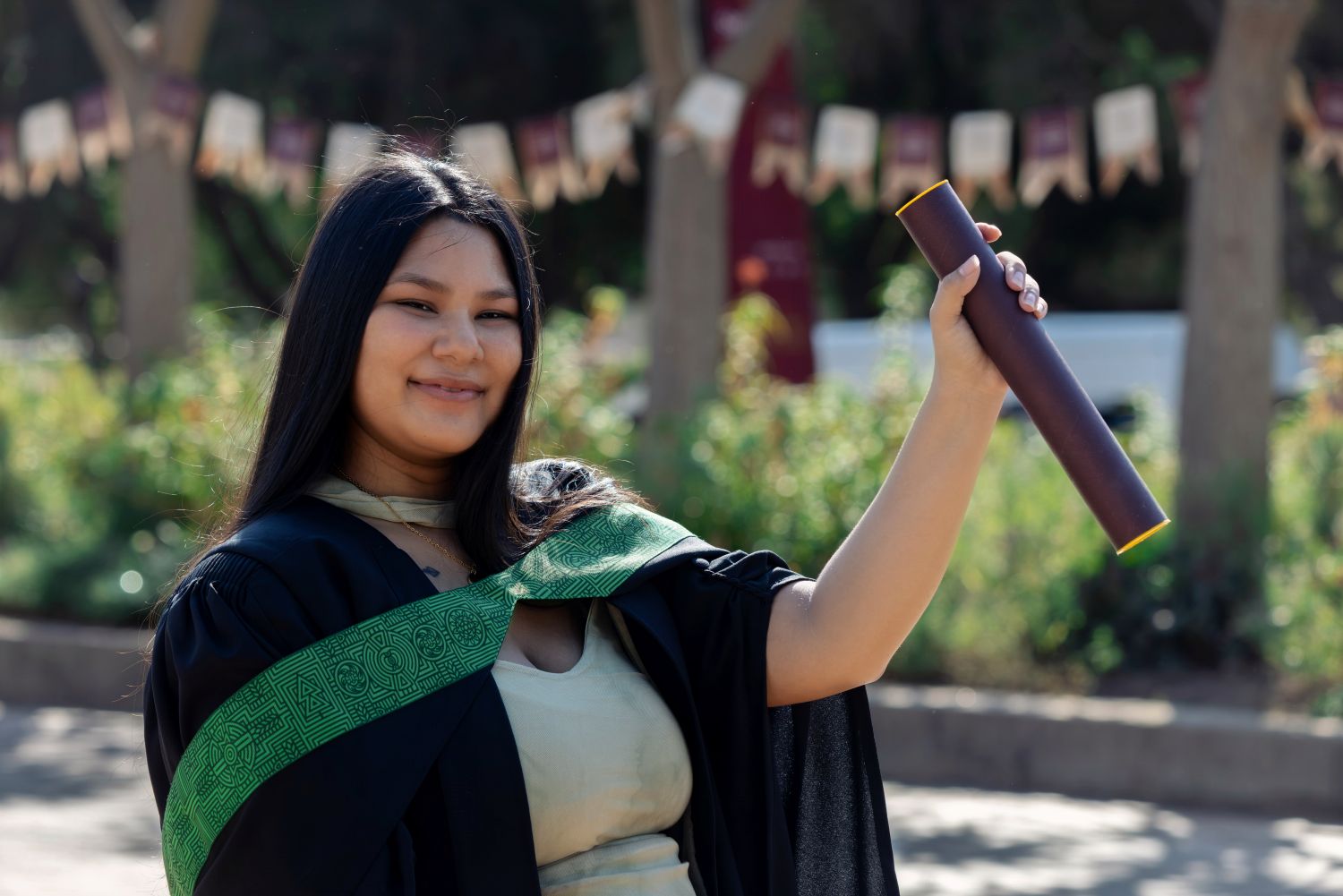 Caitlin Sampson with her degree