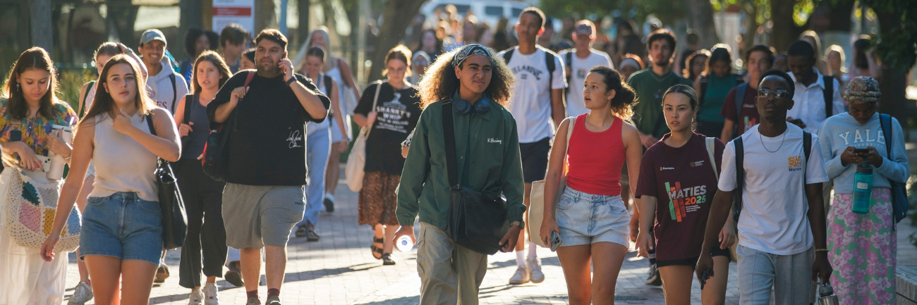Students at Stellenbosch University photographed as they are walking to classes on the Stellenbosch campus.