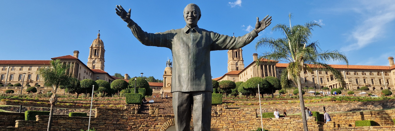 A statue of Nelson Mandela in front of the Union Buildings in Pretoria, South Africa.