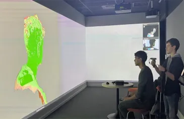 Student do headshot scan inside the Immersive Technology Lab in Stellenbosch University Library