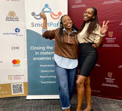 Celestine Kemunto Nyamari, a CERI Africa Stars Research Fellow from Kenya, engaging with a fellow CERI Scholar in Stellenbosch