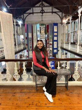 Celestine Kemunto Nyamari, a CERI Africa Stars Research Fellow from Kenya, during an excursion to the District Six Museum in Cape Town