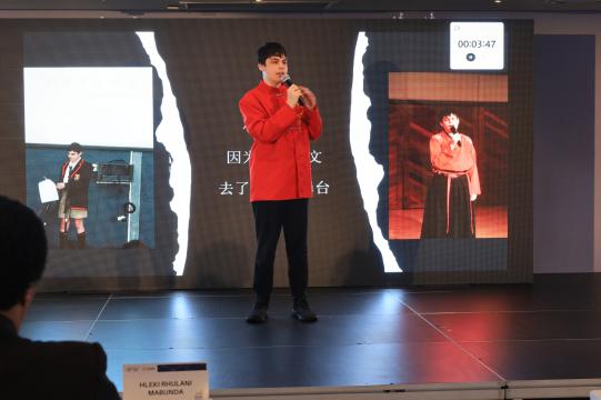 Secondary School learner, Stefan Prins, performing at the Chinese Bridge Competition
