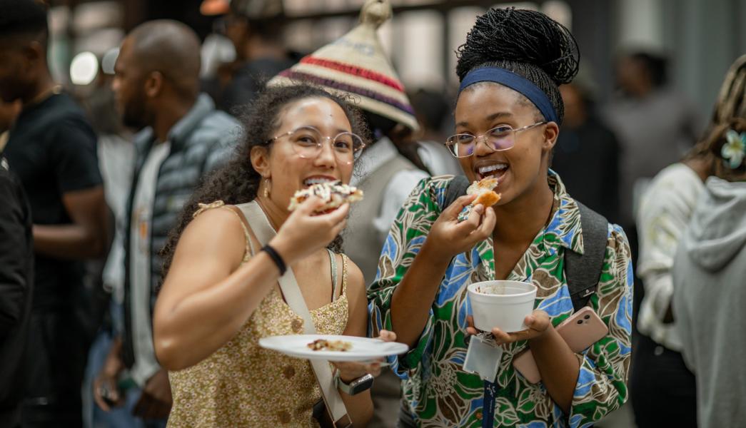 Students enjoying their meal at the international food evening 