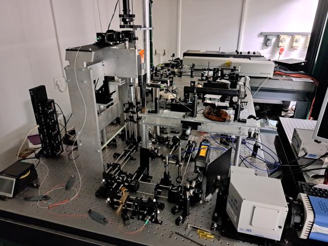 Experimental setup for optical trapping in a photonics lab in the Merensky Building, Department of Physics