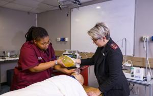 Student and teacher in skills lab
