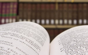 Bookshelf with hardcover academic texts