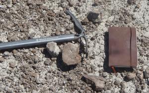 Geologists' hammer and field note book