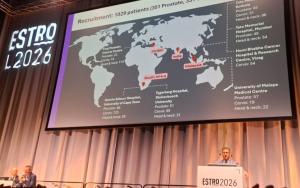 ESTRO conference powerpoint on screen