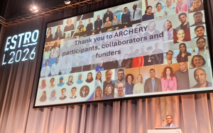 ESTRO conference powerpoint on screen