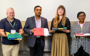 A flag ceremony celebrating cooperation between Stellenbosch University and Danish universities.