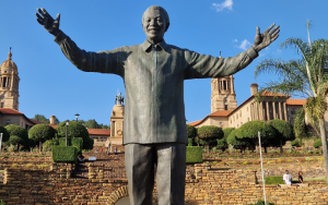 A statue of Nelson Mandela in front of the Union Buildings in Pretoria, South Africa.