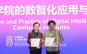 Prof Zheng and Ms Snyman Receiving an Award on behalf of the CISU in Xiamen, China