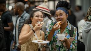 Students enjoying their meal at the international food evening 
