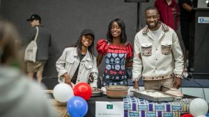 Students a the french stall at the international food evening