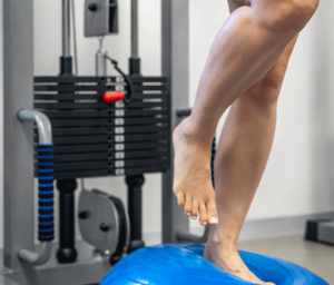 balance-exercise-with-bosu-ball-woman-gym