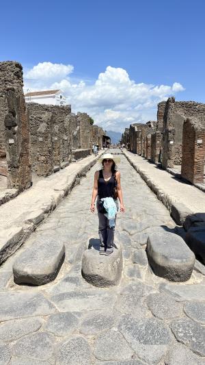Dr Samantha Masters standing in an ancient site