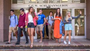 Students exiting CGW Schumann Building