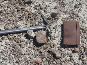Geologists' hammer and field note book