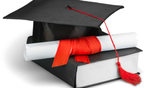 Graduation cap on book