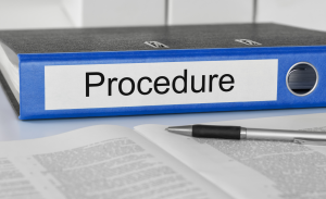 file binder with the word procedure