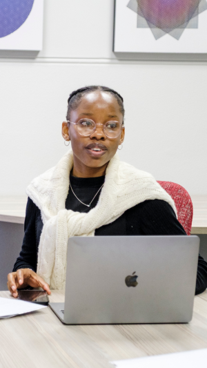 Student sitting in front of laptop