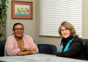 Photo of the Ombud's Admin Officer Ms Grace Bruintjies and the Ombud Advocate Rina Meyer.