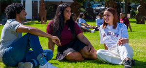 Students sitting on grass