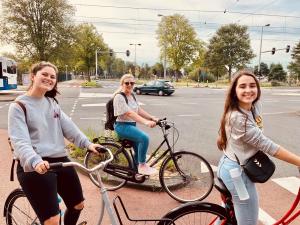 SU Student Liza Victor and fellow students riding bikes in the Netherlands