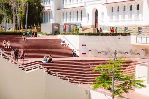 Arial photo of campus showing the library steps 