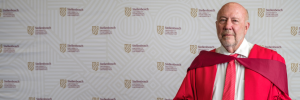 Dr Robert Adam receives SU honorary degree for advancing science and technology