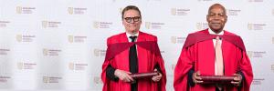 SU awards honorary doctorates to economic experts