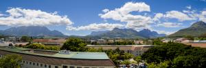 A view of part of the Stellenbosch campus from the Department of Educational Psychology with mountains in the background.
