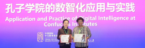 Prof Zheng and Ms Snyman Receiving an Award on behalf of the CISU in Xiamen, China