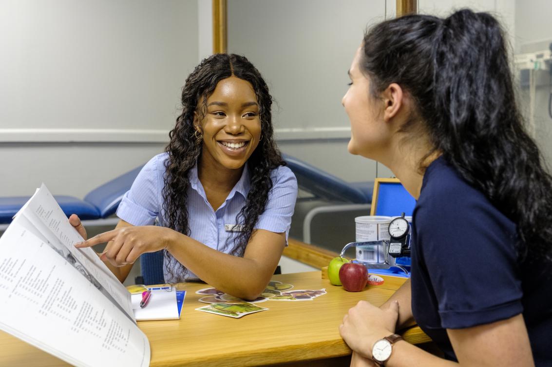 Two medical students studying together