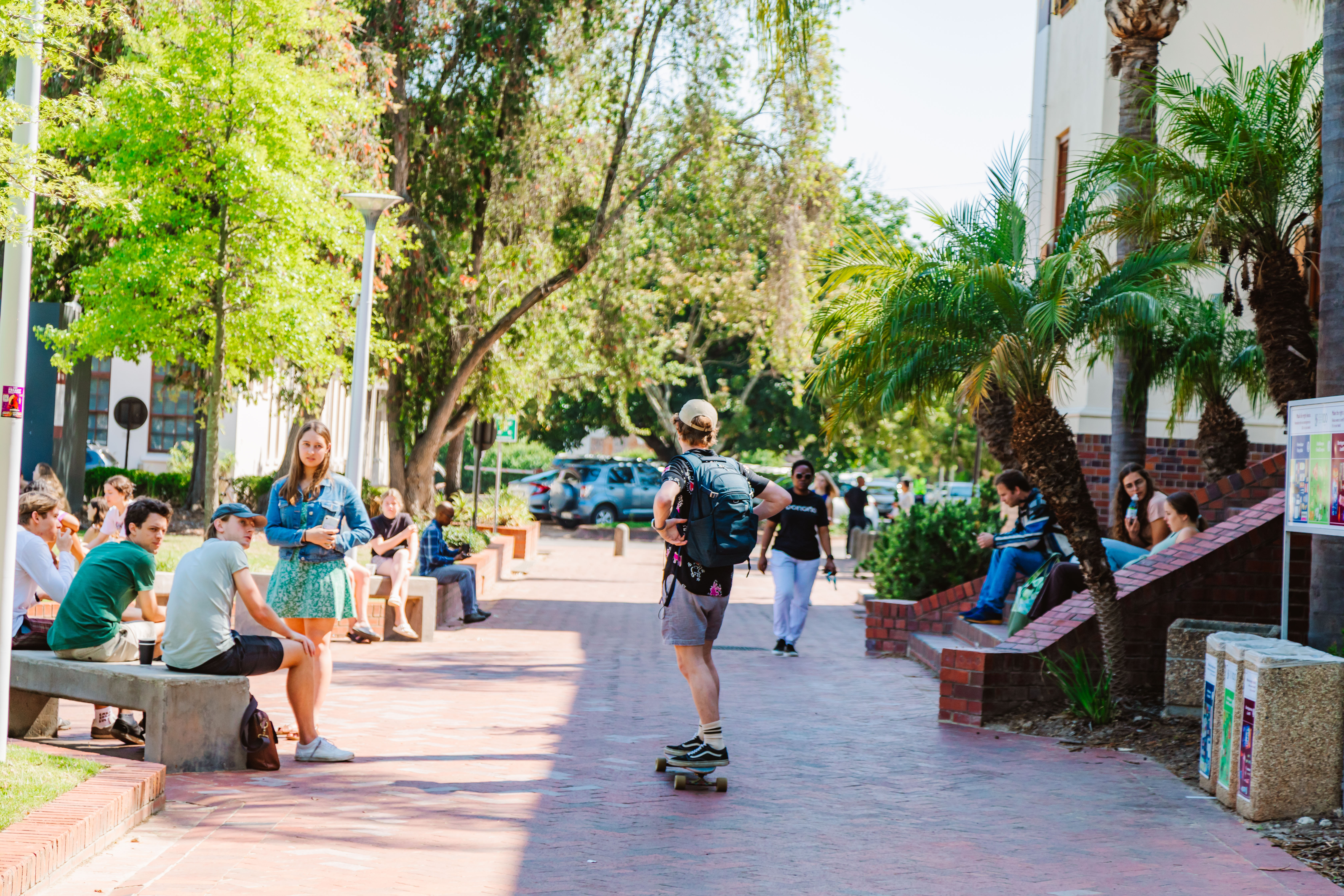 SU student on skate board
